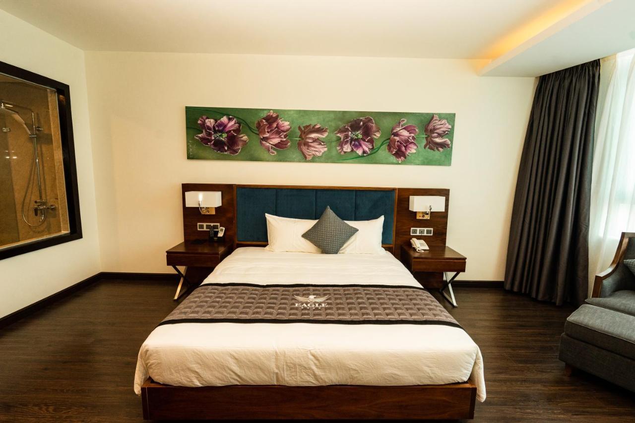 Eagle Hotel Dai Tiet Exterior photo
